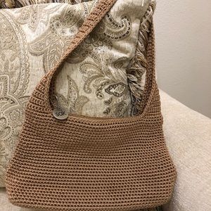 Tan hand bag.